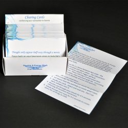 Open box of clearing cards with flyer